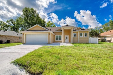 This newly remodeled 3-bedroom, 3-bathroom home in the desirable on The Grand Club - Pine Lakes Course in Florida - for sale on GolfHomes.com, golf home, golf lot