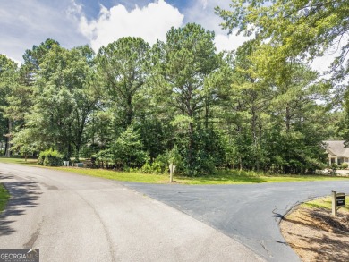 Don't miss this rare opportunity to own a premium lot located on on Great Waters Course At Reynolds Plantation in Georgia - for sale on GolfHomes.com, golf home, golf lot