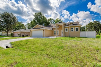 This newly remodeled 3-bedroom, 3-bathroom home in the desirable on The Grand Club - Pine Lakes Course in Florida - for sale on GolfHomes.com, golf home, golf lot