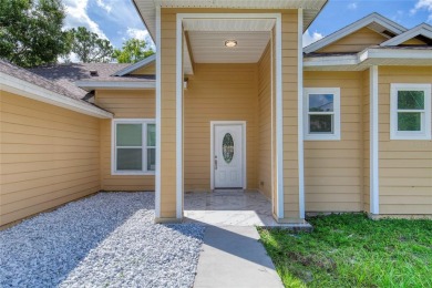 This newly remodeled 3-bedroom, 3-bathroom home in the desirable on The Grand Club - Pine Lakes Course in Florida - for sale on GolfHomes.com, golf home, golf lot