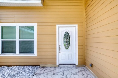 This newly remodeled 3-bedroom, 3-bathroom home in the desirable on The Grand Club - Pine Lakes Course in Florida - for sale on GolfHomes.com, golf home, golf lot