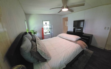 Tucked-Away Treasure - Updated & Move-In Ready for Just $50,000! on Rolling Greens Executive Golf Community in Florida - for sale on GolfHomes.com, golf home, golf lot