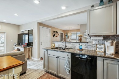 ON LEASED LAND***  This beautifully updated TURN-KEY home is on London Bridge Golf Course in Arizona - for sale on GolfHomes.com, golf home, golf lot