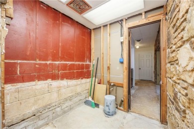 Tucked at the end of a quiet looped road, this 3-bedroom, 1 on Independence Country Club in Kansas - for sale on GolfHomes.com, golf home, golf lot