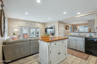 ON LEASED LAND***  This beautifully updated TURN-KEY home is on London Bridge Golf Course in Arizona - for sale on GolfHomes.com, golf home, golf lot