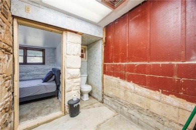 Tucked at the end of a quiet looped road, this 3-bedroom, 1 on Independence Country Club in Kansas - for sale on GolfHomes.com, golf home, golf lot