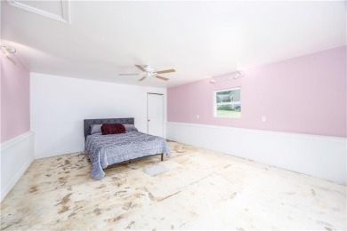 Tucked at the end of a quiet looped road, this 3-bedroom, 1 on Independence Country Club in Kansas - for sale on GolfHomes.com, golf home, golf lot