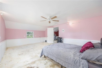 Tucked at the end of a quiet looped road, this 3-bedroom, 1 on Independence Country Club in Kansas - for sale on GolfHomes.com, golf home, golf lot