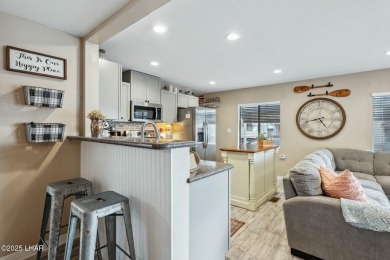 ON LEASED LAND***  This beautifully updated TURN-KEY home is on London Bridge Golf Course in Arizona - for sale on GolfHomes.com, golf home, golf lot
