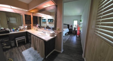 Tucked-Away Treasure - Updated & Move-In Ready for Just $50,000! on Rolling Greens Executive Golf Community in Florida - for sale on GolfHomes.com, golf home, golf lot