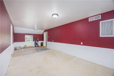 Tucked at the end of a quiet looped road, this 3-bedroom, 1 on Independence Country Club in Kansas - for sale on GolfHomes.com, golf home, golf lot