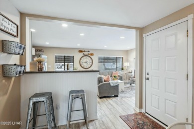ON LEASED LAND***  This beautifully updated TURN-KEY home is on London Bridge Golf Course in Arizona - for sale on GolfHomes.com, golf home, golf lot