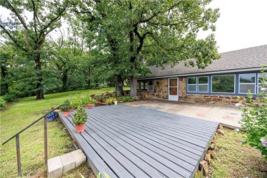 Tucked at the end of a quiet looped road, this 3-bedroom, 1 on Independence Country Club in Kansas - for sale on GolfHomes.com, golf home, golf lot