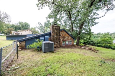 Tucked at the end of a quiet looped road, this 3-bedroom, 1 on Independence Country Club in Kansas - for sale on GolfHomes.com, golf home, golf lot