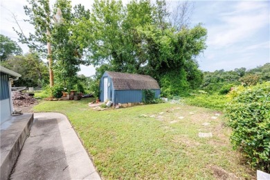 Tucked at the end of a quiet looped road, this 3-bedroom, 1 on Independence Country Club in Kansas - for sale on GolfHomes.com, golf home, golf lot