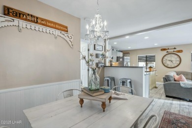 ON LEASED LAND***  This beautifully updated TURN-KEY home is on London Bridge Golf Course in Arizona - for sale on GolfHomes.com, golf home, golf lot