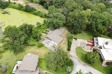 Tucked at the end of a quiet looped road, this 3-bedroom, 1 on Independence Country Club in Kansas - for sale on GolfHomes.com, golf home, golf lot