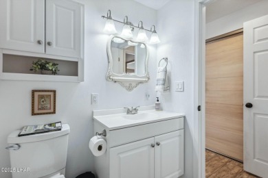ON LEASED LAND***  This beautifully updated TURN-KEY home is on London Bridge Golf Course in Arizona - for sale on GolfHomes.com, golf home, golf lot