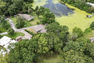 Tucked at the end of a quiet looped road, this 3-bedroom, 1 on Independence Country Club in Kansas - for sale on GolfHomes.com, golf home, golf lot