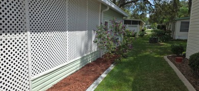 Tucked-Away Treasure - Updated & Move-In Ready for Just $50,000! on Rolling Greens Executive Golf Community in Florida - for sale on GolfHomes.com, golf home, golf lot