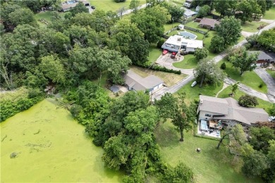 Tucked at the end of a quiet looped road, this 3-bedroom, 1 on Independence Country Club in Kansas - for sale on GolfHomes.com, golf home, golf lot