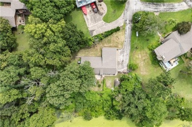 Tucked at the end of a quiet looped road, this 3-bedroom, 1 on Independence Country Club in Kansas - for sale on GolfHomes.com, golf home, golf lot