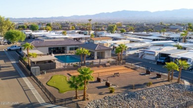 ON LEASED LAND***  This beautifully updated TURN-KEY home is on London Bridge Golf Course in Arizona - for sale on GolfHomes.com, golf home, golf lot