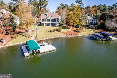 Welcome to this stunning Lake Oconee retreat located on on Harbor Club Golf and Country Club in Georgia - for sale on GolfHomes.com, golf home, golf lot