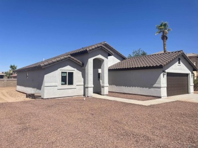 Welcome to your dream oasis in Yuma Welton! Nestled close to a on The Links At Coyote Wash in Arizona - for sale on GolfHomes.com, golf home, golf lot