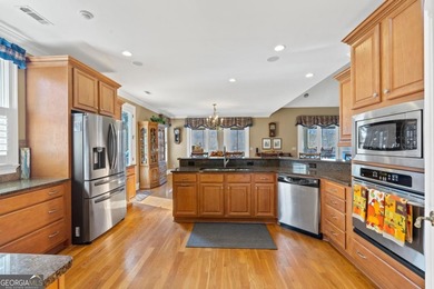 Welcome to this stunning Lake Oconee retreat located on on Harbor Club Golf and Country Club in Georgia - for sale on GolfHomes.com, golf home, golf lot