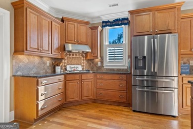 Welcome to this stunning Lake Oconee retreat located on on Harbor Club Golf and Country Club in Georgia - for sale on GolfHomes.com, golf home, golf lot