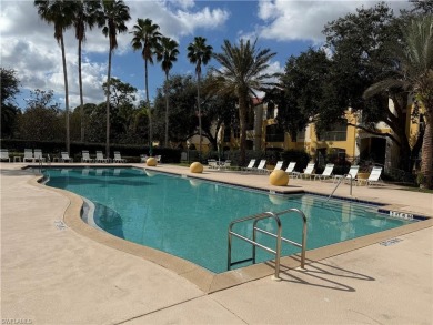 This spacious condo has updraded travertine tile throughout on Gateway Golf and Country Club in Florida - for sale on GolfHomes.com, golf home, golf lot