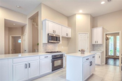 Nestled within the prestigious, guard-gated community of on Heritage Lakes - Par 3 - 9 Hole Course in Texas - for sale on GolfHomes.com, golf home, golf lot