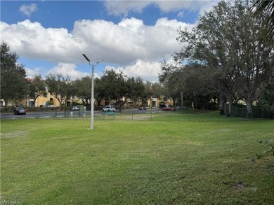 This spacious condo has updraded travertine tile throughout on Gateway Golf and Country Club in Florida - for sale on GolfHomes.com, golf home, golf lot