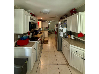 Wow!! What a deal!! This turnkey (except for a few specific on Riverwood Golf Club in Florida - for sale on GolfHomes.com, golf home, golf lot