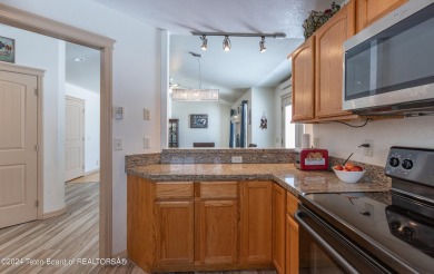 Enjoy a beautiful 5 bedroom 3 bath home with all new wood, title on Cedar Creek Golf Course in Wyoming - for sale on GolfHomes.com, golf home, golf lot