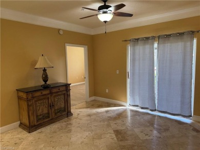 This spacious condo has updraded travertine tile throughout on Gateway Golf and Country Club in Florida - for sale on GolfHomes.com, golf home, golf lot