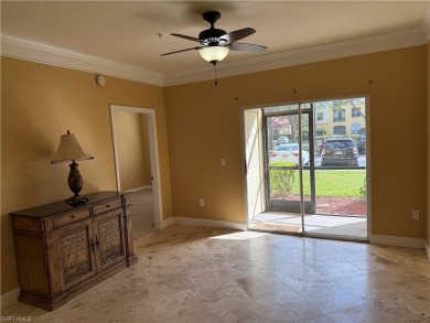 This spacious condo has updraded travertine tile throughout on Gateway Golf and Country Club in Florida - for sale on GolfHomes.com, golf home, golf lot