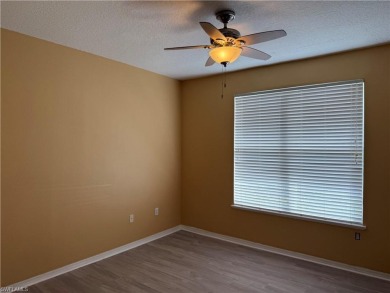 This spacious condo has updraded travertine tile throughout on Gateway Golf and Country Club in Florida - for sale on GolfHomes.com, golf home, golf lot