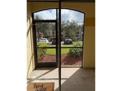 This spacious condo has updraded travertine tile throughout on Gateway Golf and Country Club in Florida - for sale on GolfHomes.com, golf home, golf lot