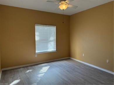 This spacious condo has updraded travertine tile throughout on Gateway Golf and Country Club in Florida - for sale on GolfHomes.com, golf home, golf lot