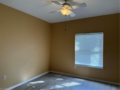 This spacious condo has updraded travertine tile throughout on Gateway Golf and Country Club in Florida - for sale on GolfHomes.com, golf home, golf lot