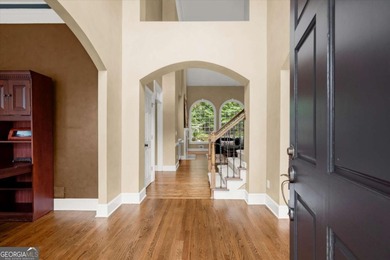 Fall is in the air, and this home frames the season on Woodmont Golf and Country Club in Georgia - for sale on GolfHomes.com, golf home, golf lot