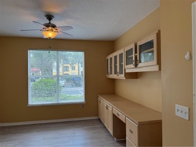 This spacious condo has updraded travertine tile throughout on Gateway Golf and Country Club in Florida - for sale on GolfHomes.com, golf home, golf lot
