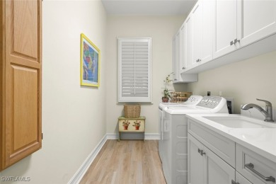 Enjoy elegant, one-level living with unobstructed panoramic on The Sanctuary Golf Club in Florida - for sale on GolfHomes.com, golf home, golf lot