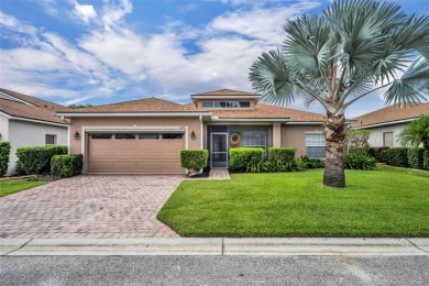 Presenting a well-maintained 2-bedroom, 2-bathroom home with an on Lake Ashton Golf Club in Florida - for sale on GolfHomes.com, golf home, golf lot