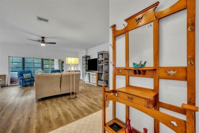 Presenting a well-maintained 2-bedroom, 2-bathroom home with an on Lake Ashton Golf Club in Florida - for sale on GolfHomes.com, golf home, golf lot