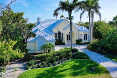 Enjoy elegant, one-level living with unobstructed panoramic on The Sanctuary Golf Club in Florida - for sale on GolfHomes.com, golf home, golf lot