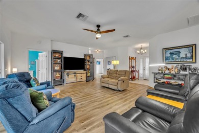 Presenting a well-maintained 2-bedroom, 2-bathroom home with an on Lake Ashton Golf Club in Florida - for sale on GolfHomes.com, golf home, golf lot