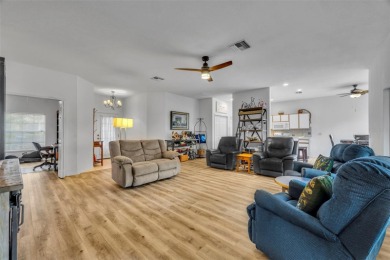 Presenting a well-maintained 2-bedroom, 2-bathroom home with an on Lake Ashton Golf Club in Florida - for sale on GolfHomes.com, golf home, golf lot